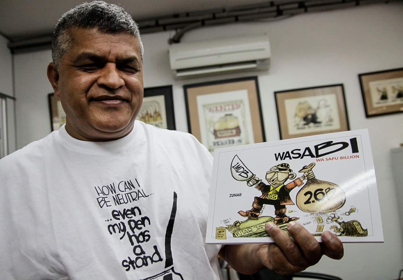 Zunar is facing a 43-year jail sentence after being charged nine times for sedition for tweets and caricatures critical of the Najib government. [Image credit: Zunar]