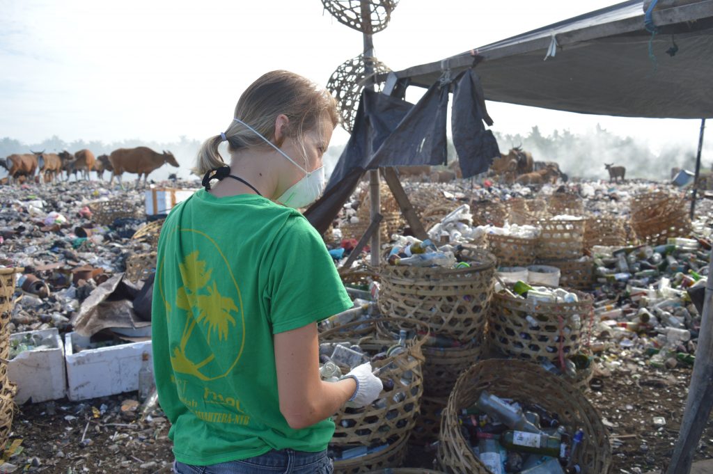 On the dump: Christine recycling glass bottles [Image credit: Aurore Kaddachi]